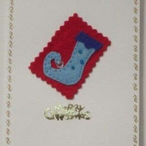 Handmade Christmas card with a blue felt Elves shoe.